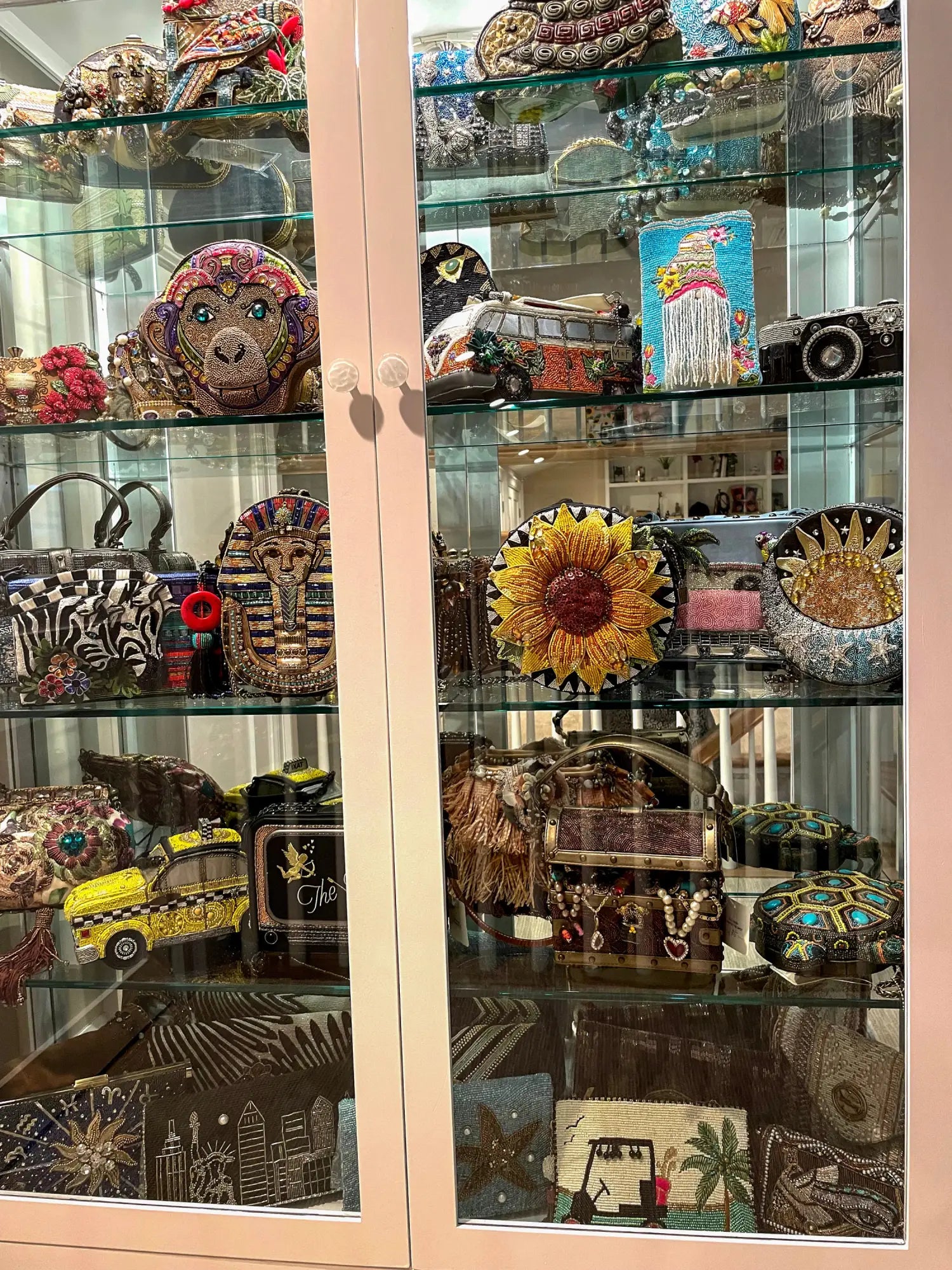 I had this display case built just for my bags