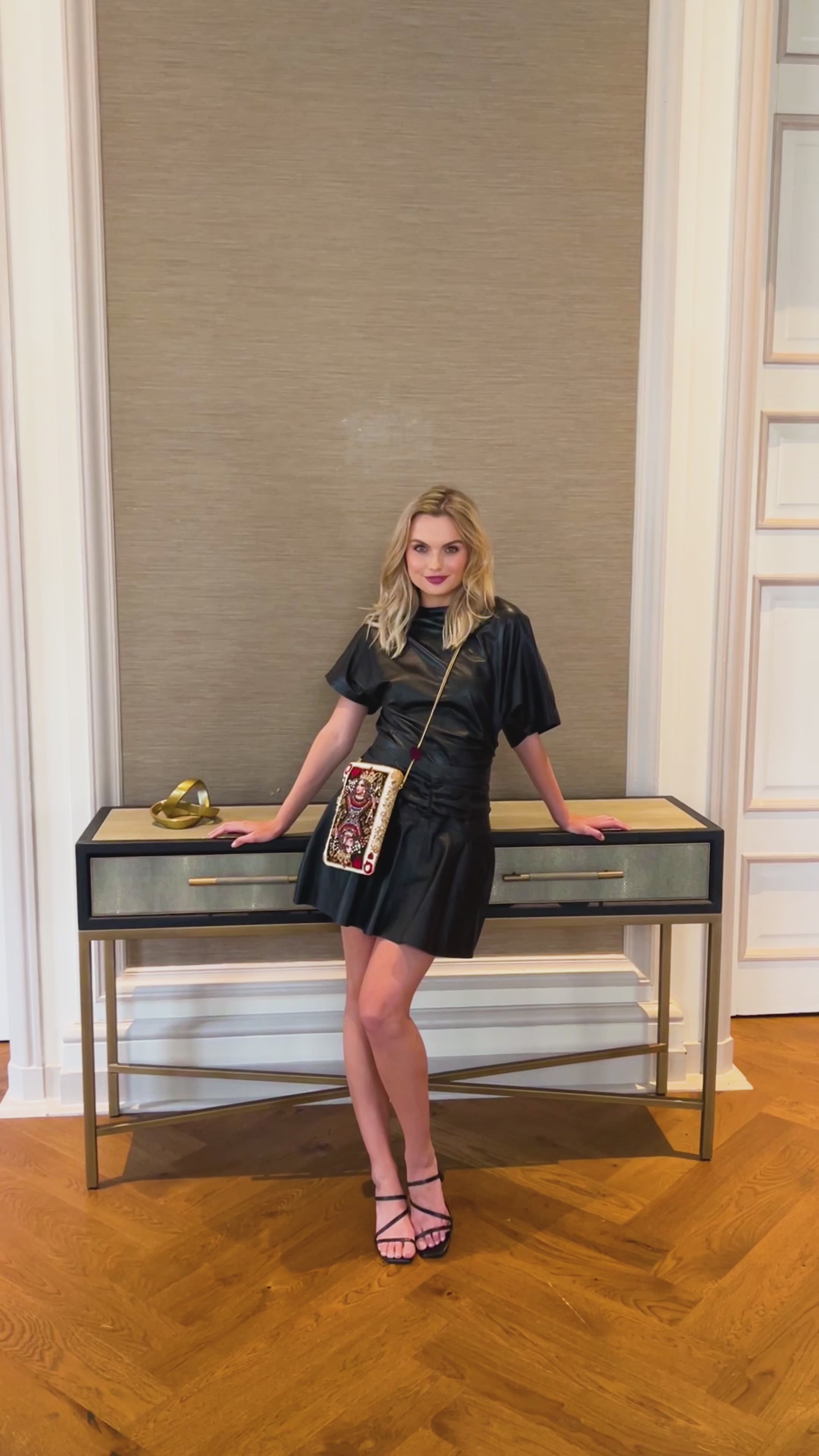 video of model wearing The Queen Mini Crossbody Handbag