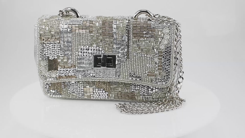 Chanel Quilted Silver Glitter Leather Reissue Shoulder Bag at 1stDibs