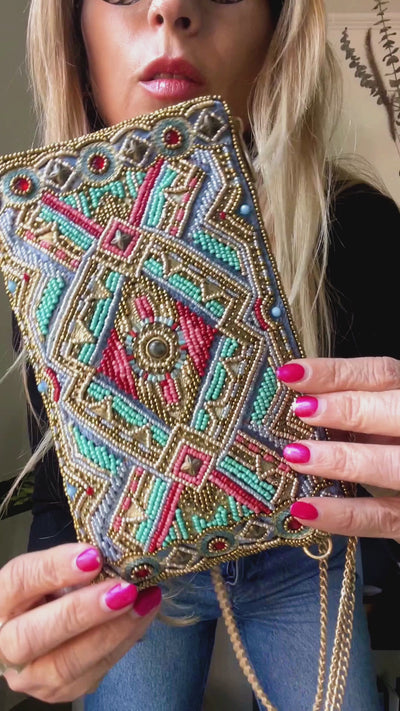 Video of model showing ways to wear Native Girl Crossbody Phone Bag