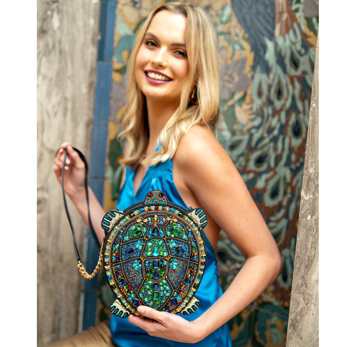model holding Wave Rider Turtle Handbag