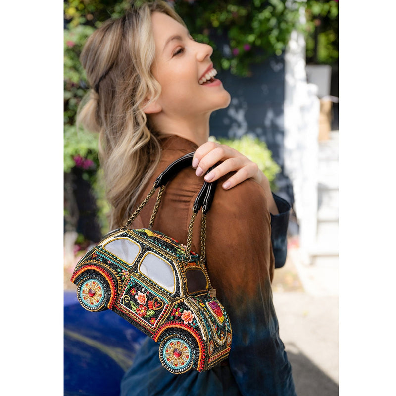 https://www.maryfrances.com/cdn/shop/products/joyride-top-handle-bag-mary-frances-accessories-102_800x.jpg?v=1664517617